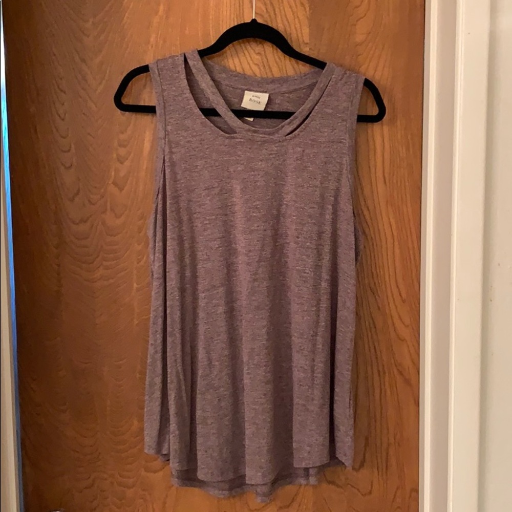Tank with neck cutouts